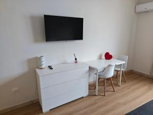 TV a/nebo společenská místnost v ubytování Appartamento Sogni d'Itria