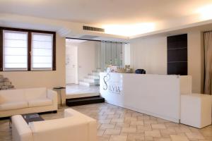 Uma área de estar em AHG Donna Silvia Wellness Hotel