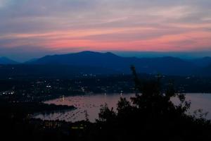 a view of a body of water at sunset at AHG Donna Silvia Wellness Hotel in Manerba del Garda +37 photos