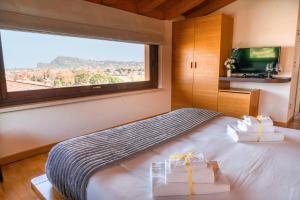 Cama ou camas em um quarto em AHG Donna Silvia Wellness Hotel