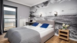 Postel nebo postele na pokoji v ubytování Gardenia, Sun & Snow