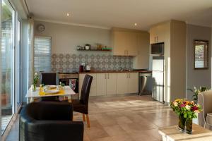 Køkken eller tekøkken på Tortelduif Cottage