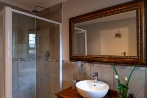 Et badeværelse på Tortelduif Cottage + 18 billeder