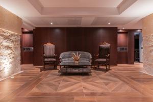 Ein Sitzbereich in der Unterkunft Hotel de La Trucha