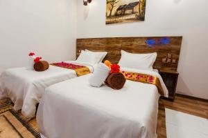 Voodi või voodid majutusasutuse Rustic Villa toas