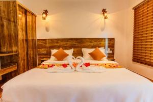 Postel nebo postele na pokoji v ubytování Rustic Villa
