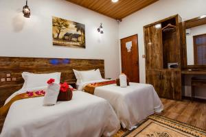 Voodi või voodid majutusasutuse Rustic Villa toas