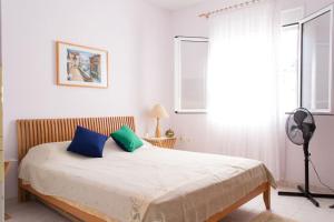 Ένα ή περισσότερα κρεβάτια σε δωμάτιο στο Holiday home in Nea Plagia, Chalkidiki