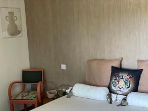 Postel nebo postele na pokoji v ubytování À l ombre des chênes