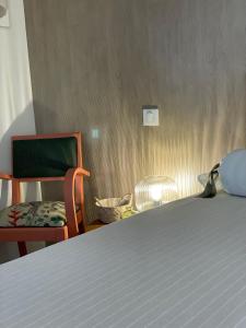 Postel nebo postele na pokoji v ubytování À l ombre des chênes