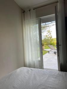 Postel nebo postele na pokoji v ubytování À l ombre des chênes + 24 fotografií