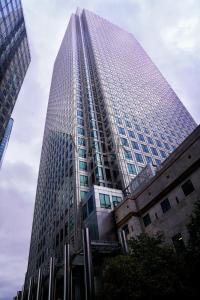 a tall building with a lot of windows at Meiru Apartment Hotel Guangzhou Bolin Apartment in Guangzhou