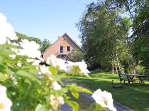 Κήπος έξω από το Watt´n Dog - Urlaub direkt am Nordseedeich