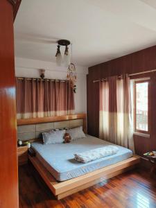 Postel nebo postele na pokoji v ubytování Peakman Residence