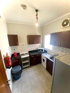 Η κουζίνα ή μικρή κουζίνα στο Elite Residence KAEC - مدينة الملك عبدالله الاقتصادية