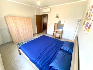 Ένα ή περισσότερα κρεβάτια σε δωμάτιο στο Elite Residence KAEC - مدينة الملك عبدالله الاقتصادية