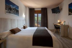 Ein Bett oder Betten in einem Zimmer der Unterkunft Hotel Marco Polo