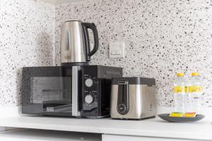 Mynd úr myndasafni af Comfortable 1BR with Amazing Views Perfect for 4! í Dúbaí