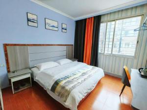 Katil atau katil-katil dalam bilik di Dihao Hostel North Railway Station