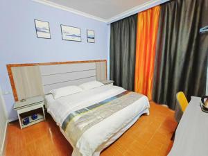 Katil atau katil-katil dalam bilik di Dihao Hostel North Railway Station