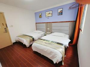 Katil atau katil-katil dalam bilik di Dihao Hostel North Railway Station
