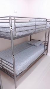 Ένα ή περισσότερα κρεβάτια σε δωμάτιο στο Hostel SOFÍA