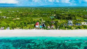 an aerial view of a resort on a beach at AHG Sun Bay Mlilile Beach Hotel in Matemwe