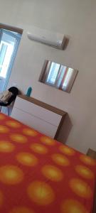 En eller flere senge i et værelse på Casa Adele + 12 billeder