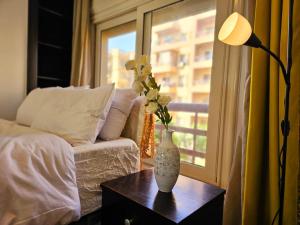 Postel nebo postele na pokoji v ubytování Discover your New Escape