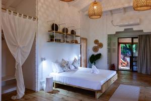 Imagem da galeria de La Pointe Beach Huts em Praslin