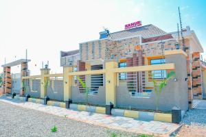 a rendering of a building in front of a building at Kamur Executive Inn in Dodoma