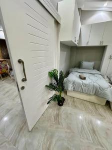 Postel nebo postele na pokoji v ubytování 2Bedrooms Penthouse's-New Cairo
