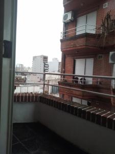 En balkon eller terrasse på Departamento cerca de todo