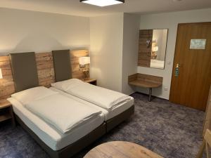 Voodi või voodid majutusasutuse Hotel Silberfelsen toas