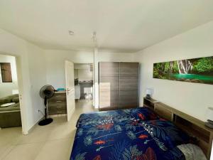 Letto o letti in una camera di Magnifique villa 6 à 8 pers avec piscine - vue mer