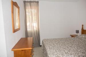 Postel nebo postele na pokoji v ubytování Casa Disfrute Sol + 9 fotografií