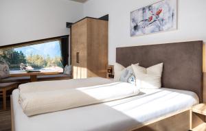 Posteľ alebo postele v izbe v ubytovaní Das Aparthotel Olympia Tirol