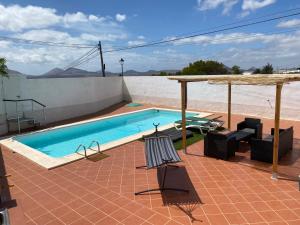 a swimming pool on top of a house at Oasis house in Nazaret