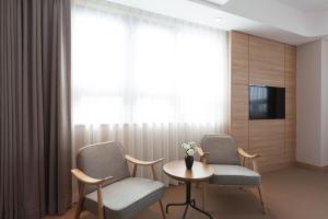 Telewizja i/lub zestaw kina domowego w obiekcie Acube Hotel Dongdaemun