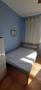 Postel nebo postele na pokoji v ubytování Kit com vista linda perto das Castanheiras