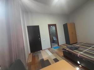 Voodi või voodid majutusasutuse Art Guest House in KASKAD toas