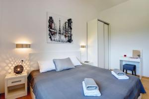 Postel nebo postele na pokoji v ubytování Villa Luna Nera + 27 fotografií