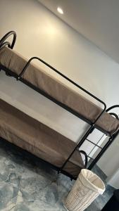 aption of a bed in a room at Aurora House 2 in Naples
