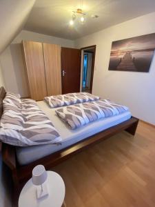 Postel nebo postele na pokoji v ubytování Ferienwohnung- Südsteirischer Traum