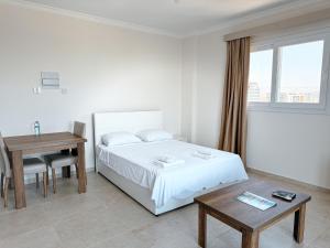 Ένα ή περισσότερα κρεβάτια σε δωμάτιο στο SEA View Studios LONG BEACH