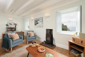 Χώρος καθιστικού στο Cove Cottage