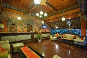 Posezení v ubytování Puri Dewa Bharata Hotel & Villas