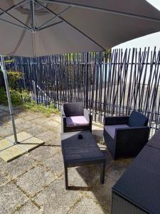 Posezení v ubytování Studio avec grande terrasse gare Sud