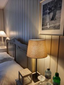 Una cama o camas en una habitación de B&B Langenberg