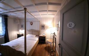Una cama o camas en una habitación de B&B Langenberg